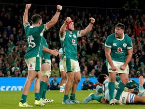 Ireland players celebrate at the final whistle against Argentina