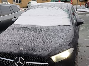 A car covered in snow