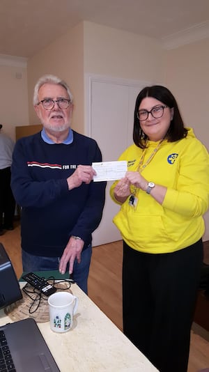 LCSG Treasurer, Howard Goslyn, presents Marie Curie Community Fundraiser with a cheque for £450.00