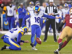 Los Angeles Rams Joshua Karty kicks a field goal from the hold of Ethan Evans