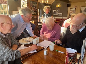 Members of the Telford Men's Breakfast Club enjoy the quiz