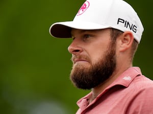 Tyrrell Hatton looks on