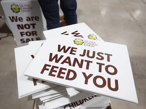 Banners reading 'We just want to feed you'