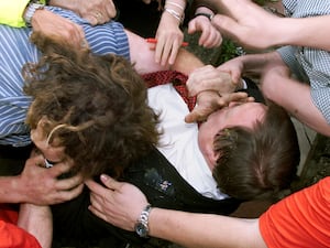 John Prescott surrounded by protesters