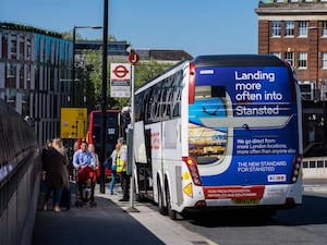 A coach picking up passengers in Paddington, west London