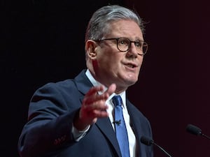 Sir Keir Starmer gestures during a speech