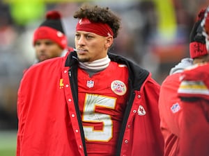 Kansas City Chiefs quarterback Patrick Mahomes watches play during the second half of an NFL football game against the Cleveland Browns,