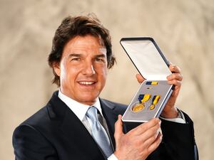 Tom Cruise with his award