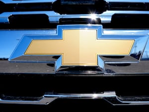 The Chevrolet logo is seen at a new and used vehicles dealership in Palatine, Illinois