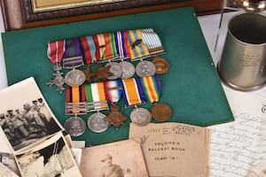 The medals awarded to Private Henry John Lawrence and his son, Company Sergeant Major Francis John De Moulan Lawrence.