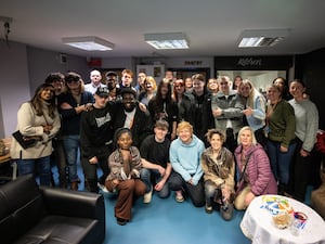 Ed Sheeran surrounded by young people at the launch of his foundation