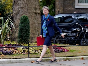 Yvette Cooper walks down Downing Street