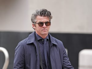 Joey Barton wearing sunglasses