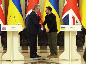 Keir Starmer and Volodymyr Zelensky shake hands