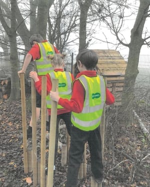 Children in hi vis vests