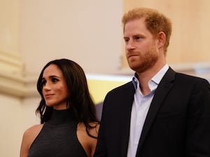 Harry and Meghan stand side by side at the Invictus Games in Dusseldorf