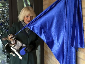 The then-Duchess of Cornwall with Beth on a visit to open kennels at the Battersea Cats and Dogs Home