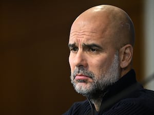 Close up of Manchester City manager Pep Guardiola at a press conference