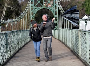 Pedestrians battling the wind in Shrewsbury