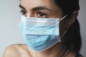 Face masks are now mandatory to help protect patients and staff from respiratory infections (Stock image)