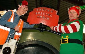 CHR Volunteer Harrison Gillham alongside Santa Helper David Roberts gearing up for the Cambrian Santa Specials