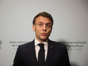 President Emmanuel Macron speaks to the media