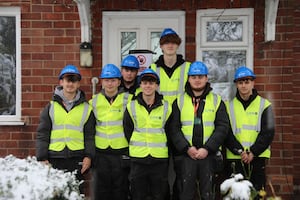 Enthusiastic Telford College students pictured outside of sister property 'The Future Ready Home, Telford.'