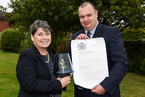 Sonia Roberts MBE and Phil Taylor of Landau recieving the queens award for Enterprise