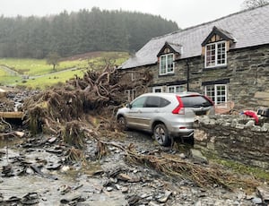 A landslide caused trees to damage the farmhouse. Picture: Trevor Bates