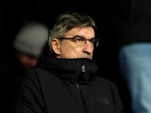 New Southampton manager Ivan Juric sits in a football dugout