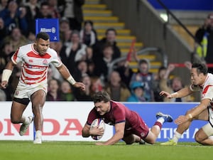 England’s George Furbank scores a try