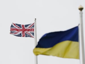 An Ukrainian and Union flag flying above Spanish City in Whitley Bay, North Tyneside