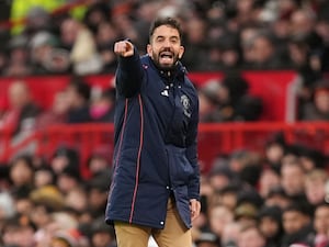 Ruben Amorim points and shouts instructions to his Manchester United team