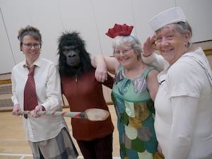 Some of the chorus members from Dick Whittington including a cannibal, gorilla, fish and a gorilla