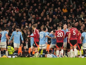 Kyle Walker lies on the floor as tempers boil over