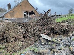 A landslide caused trees to damage the farmhouse. Picture: Trevor Bates