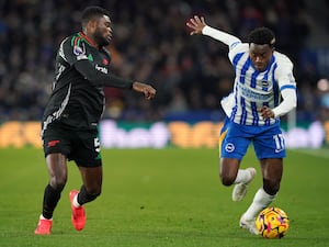 Thomas Partey battles for the ball