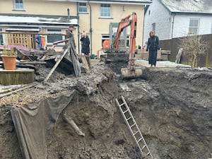 Mid and West WalesSenedd Member Jane Dodds views some of the flooding damage in Llanwrtyd Wells