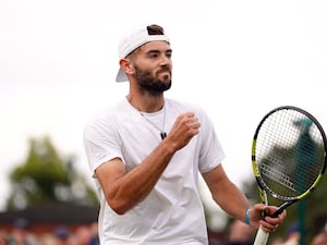 Jacob Fearnley reacts to a point