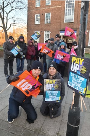 Peter Grue and Jean Parkes with striking workers on the picket.