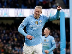 Erling Haaland celebrates scoring against West Ham