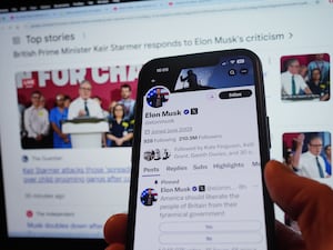 The official account of Elon Musk on social media app X displaying a pinned post, a poll asking if ‘America should liberate the people of Britain from their tyrannical government’, on a mobile phone in London