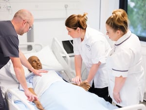 The college has industry-standard facilities, including replica hospital wards for health students.