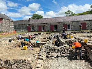 Excavations in the courtyard where charcoal samples were found