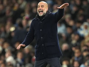 Manchester City manager Pep Guardiola points on the touchline