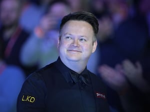 Shaun Murphy walks in for his semi-final at the 2025 Masters at Alexandra Palace