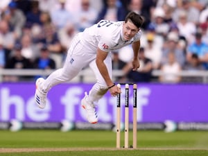 England’s Matthew Potts bowls