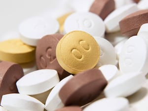 White, yellow and brown tablets of OxyContin