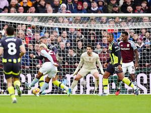 Morgan Rogers shoots to score Aston Villa's second goal against Manchester City (Mike Egerton/PA)