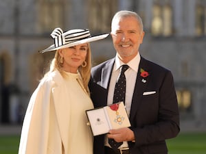 Graeme Souness and his wife Karen outside the palace